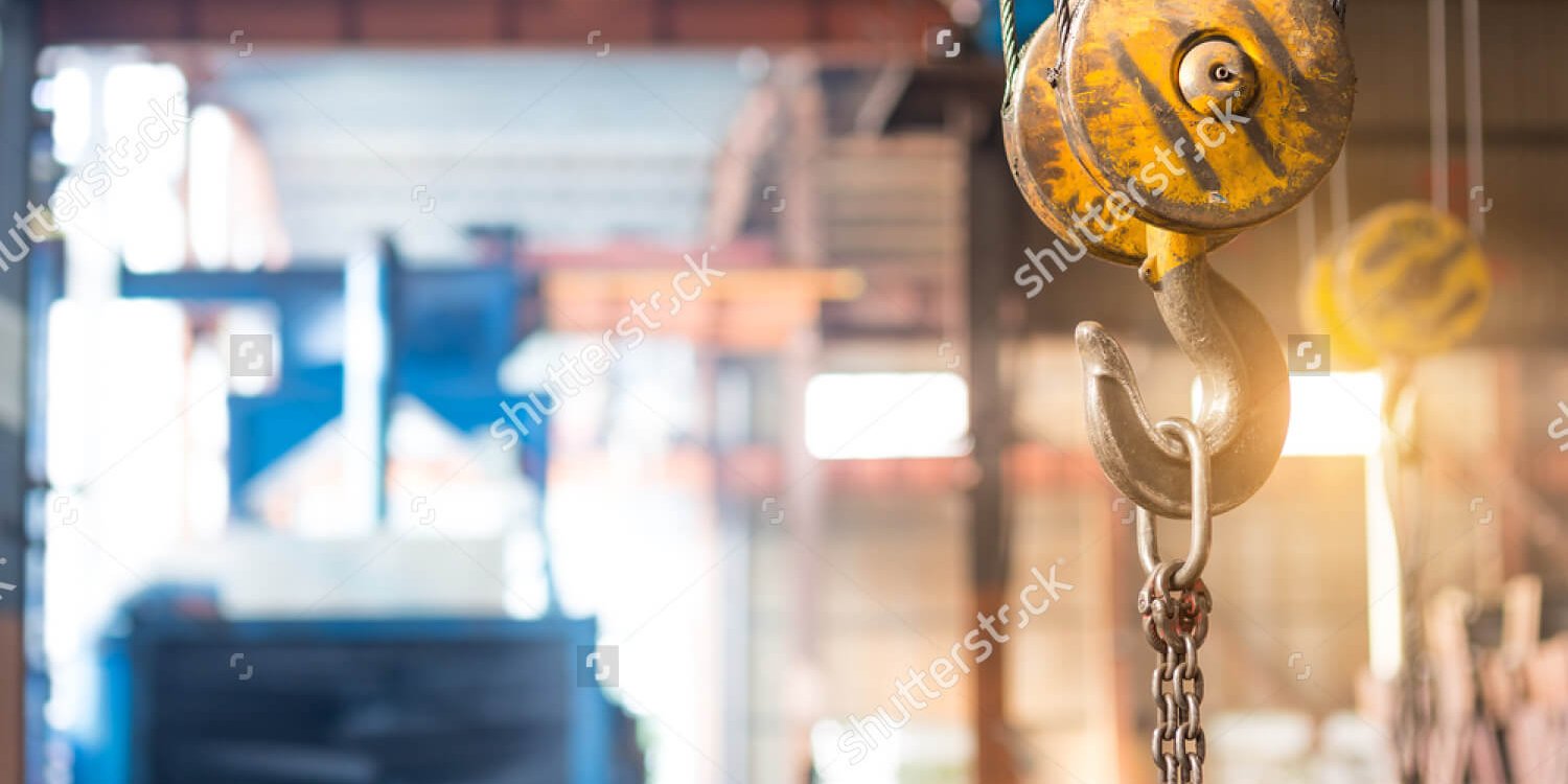 stock-photo-empty-warehouse-interior-with-crane-hook-380507725